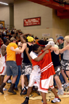 Union players and fans rush the court after the Bulldogs took down Mountain State College (NAIA #1) during Homecoming.
 - Photo by Kristen Nicole Sayres