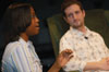 DMS major Jande Jackson talks about her film <i>Milking the Town</i> with host Eric Murrell during the 2004 Student Film Festival. - Photo by Jonathan Blair