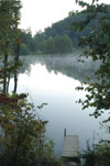 A misty morning lake greeted the rafters during Adventure Programs' whitewater rafting trip. - Photo by Jonathan Blair