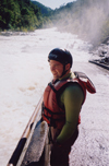 Director of Student Programs Mark VanderHaar takes an excited look at the falls on the Ocoee before departing on the lower half of the river during the Adventure Programs' white water trip. - Photo by Cam Tracy