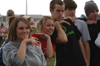 Erin Moody, Keely Hart, Jennifer Davis, Landon Preston, Rob Krauss and John Harber do their best turkey impressions during the Young Alums' Turkey Bowl. - Photo by Kristen Hiller