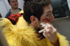 DMS major Eric Murrell works on his makeup for a taping of a webisode of UBuzz. UBuzz Director Trae Cadenhead looks on. - Photo by Jonathan Blair
