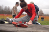 Senior Janelle Royer Campbell stretches before the 2004 NAIA National Cross Country Meet. - Photo by Kristen Nicole Sayres