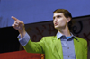 Sophomore Ronald Long seeks out participants during the SAC Game Show. - Photo by Kathleen Murray