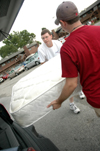 Senior Justin Belsly assists a parent on Freshman Move-In Day. - Photo by Kristen Nicole Sayres