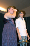 Sophomore Ross Barnes watches as senior Clayton Sanderson downs a cup full of grossness during the Focus Show. - Photo by Brad Moore