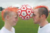 Several players on the men's soccer team recently found a 'colorful' way to show their enthusiam for their upcoming season. The players sported new hair styles in a myriad of cherry reds, sunset oranges and canary yellows. - Photo by Heather Phillips