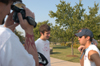Aaron Hardin stands by to shoot footage for the third episode of <i>uBuzz</i> while Kyle Rains tries to recruit junior Bryan Spillman for the fictitious fraternity <i>Upsilon Beta Zeta.</i> - Photo by Heather Phillips