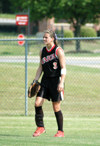 Holly Haycraft stands ready in center field during the NAIA Region XI Tournament at Union. Union would go on to win the tounament and advance to the NAIA Softball National Championship. - Photo by Steven Aldridge