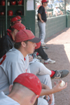 Sophomore pitcher John Mark Walls (with baseball in hand) looks on from the dugout as Union makes their run to the winner's bracket championship in the TranSouth Conference Tournament. - Photo by Steven Aldridge