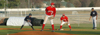 Union's Clint Arthur (9) works from the stretch during the Bulldog's win over Lambuth.  First baseman, Josh Allen (11) holds the runner. - Photo by Steven Aldridge