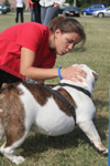Junior Gina Orosz hangs out with Union's mascot Buster on a flag football game's sidelines during Family Weekend. - Photo by Kyle Kurlick
