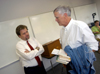 Author Clyde Edgerton (right) visits with English professor Gene Fant during Edgerton's visit to Union's campus.  - Photo by Morris Abernathy