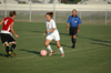 Freshman Megan Okerson attempts to advance the ball up the field versus Martin Methodist College. - Photo by Steven Aldridge