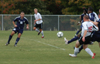 Junior Gareth Munro (19) kicks the ball towards Mark Forrest (8) for what would be Union's first tally during Union's 4-1 win over Missouri Baptist University.  For Forrest, this goal was his first career goal. - Photo by Steven Aldridge