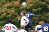 Scott Sinclair jumps with a two Missouri Baptist players as they battle for the ball. - Photo by Steven Aldridge