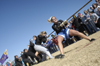 The Zetas dig in during the tug of war at the Greek Olympics. - Photo by Kathleen Murray