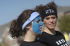 Zetas Jenny Cherry and Rachel Swafford show off their colors during the Greek Olympics. - Photo by Kathleen Murray