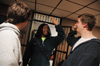 Junior Jande Jackson gives Sophomore Tyler Whetstone a high five after listening to Voddie Baucham in Hurt Commons. - Photo by Kristen Nicole Sayres