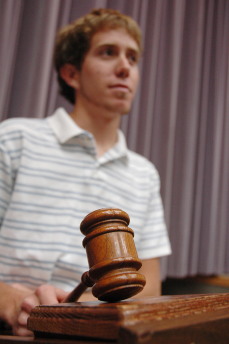 Senior Brad Spencer, outgoing SGA president, bangs the gavel for one last time at Union.