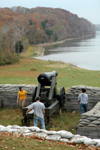 Jennifer May, Dr. David Thomas, and Sharon Hart look at a Civil War Confederate cannon on the Cumberland River at Fort Donelson National Battlefield after their Day of Remembrance service project. - Photo by Jim Veneman