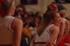 Freshman Becky Ranfeld, here seen enjoying a laugh at the women's game against Southern Nazarene University, is one of the many new faces to the Union cheerleading squad this year. - Photo by Kristen Nicole Sayres