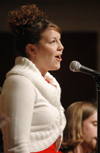 Senior Shaundra Bloomberg sang <em>I Get A Kick Out Of You</em> by Cole Porter during the Jazz Band Concert. - Photo by Brad Moore