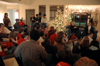 Union students gather to hear Dr. Dockery retell the classic Christmas story in McAfee Commons. - Photo by Kristen Nicole Sayres