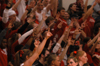 Fans celebrate a three-point basket during the Bulldog's home game against Lambuth. - Photo by Heather Phillips