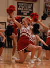 The cheerleading squad performs a cheer during a timeout at the Lambuth home game. - Photo by Heather Phillips