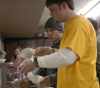 Andrew Smith and other college students at Poplar Heights Baptist Church serve at a fund raising event for an upcoming GO trip. - Photo by Stephanny Rodriguez