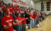Students celebrate the first Union basket of the game with confetti and cheering. - Photo by Brad Moore