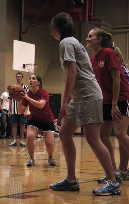 Kayli Anthony focuses on a free throw at a ladies intramural basketball game.