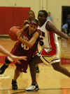 D.J. Sissoko tries to stop the Cumberland player from driving to the basket.  - Photo by Heather Phillips