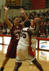 D.J. Sissoko (55) tries to keep the ball away from the Cumberland University defender.  - Photo by Heather Phillips