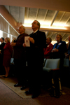 President Dockery and Dr. Phil Jett, pastor of Englewood Baptist Church and president of the TBC, stand during the opening praise time of the Homecoming chapel. - Photo by Heather Phillips
