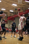 Junior center Ben Frederick (54) yanks down a long rebound from a missed free throw in Union's win over Mountain State (W. Va.) at Homecoming 2006. - Photo by Kyle Kurlick