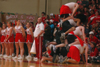 The Union Cheerleaders watch as members of SAE form a pyramid during the Homecoming game. - Photo by Kristen Nicole Sayres