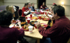 Students gather for fondue in the McAfee Commons. - Photo by Stephanny Rodriguez