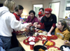 Students gather for fondue in the McAfee Commons. - Photo by Stephanny Rodriguez