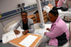 Nursing students review their notes during a class in the nursing lab on the Germantown campus. - Photo by Morris Abernathy