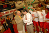 The Union Lady Bulldogs douse their head coach Mark Campbell in celebration of a second consecutive NAIA national championship. - Photo by Morris Abernathy