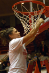 Senior guard Jennifer Henson begins the net-cutting ceremony following a second consecutive NAIA national championship for the Union Lady Bulldogs - Photo by Jim Veneman