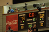 As Union's broadcast team surveys the floor of Oman Arena, the scoreboard tells the story of the Lady Bulldogs' championship victory. - Photo by Jim Veneman