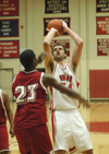 Junior center Ben Frederick (54) takes a shot over a Martin Methodist defender in Union's win. - Photo by Steven Aldridge
