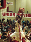 Deywane Lee (24) snatches a rebound out of mid air in Union's win over Martin Methodist. - Photo by Steven Aldridge