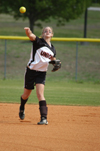 Sophomore shortstop Amy Chatham makes a throw across the diamond to putout a runner at first. - Photo by Steven Aldridge