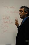 Darin White, professor of marketing, leads a class in the school of business. - Photo by Heather Phillips