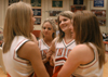 Several Union cheerleaders prepare for the Lady Bulldog's national championship celebration in Fred DeLay Gymnasium. - Photo by Heather Phillips