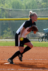 Senior pitcher Mary Kosco in the middle of her delivery in Union's win over Martin Methodist. - Photo by Steven Aldridge